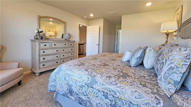 carpeted bedroom with baseboards, visible vents, and recessed lighting