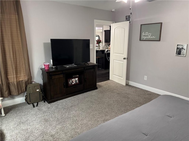 living area with carpet flooring and baseboards