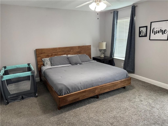 bedroom featuring a ceiling fan, baseboards, and carpet flooring