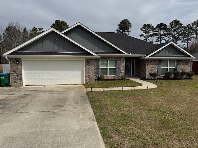 view of front of house with a garage, brick siding, concrete driveway, a front lawn, and board and batten siding