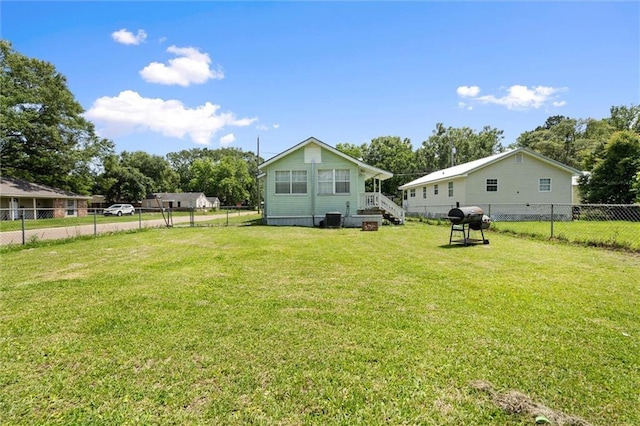 250 10th Ave, Chickasaw, AL 36611 - rear view of property with a fenced backyard
