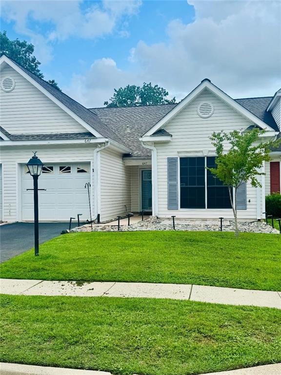 647 Spring Lake Ct, Mobile, AL 36695 - ranch-style house with a garage, asphalt driveway, a front lawn, and a shingled roof
