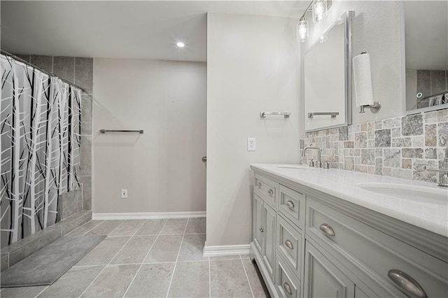 647 Spring Lake Ct, Mobile, AL 36695 - bathroom with double vanity, recessed lighting, backsplash, and a shower with curtain