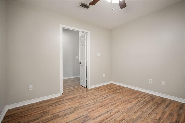 647 Spring Lake Ct, Mobile, AL 36695 - spare room featuring a ceiling fan and wood finished floors