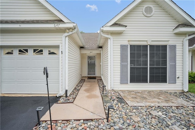 647 Spring Lake Ct, Mobile, AL 36695 - property entrance featuring a shingled roof and a garage