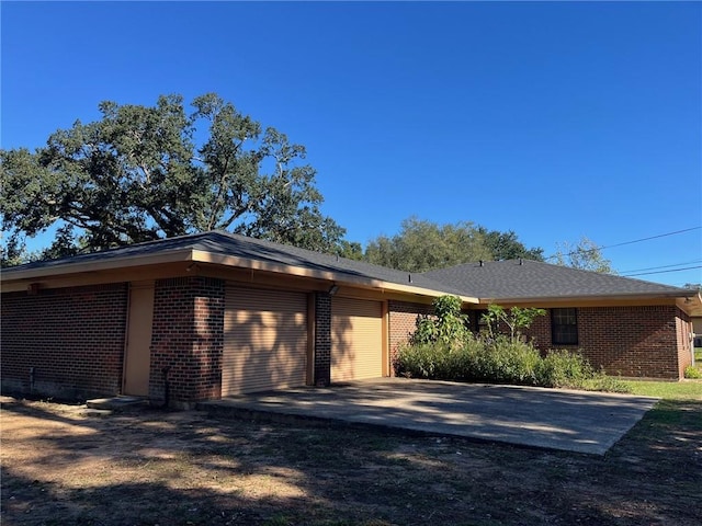 exterior space with a garage