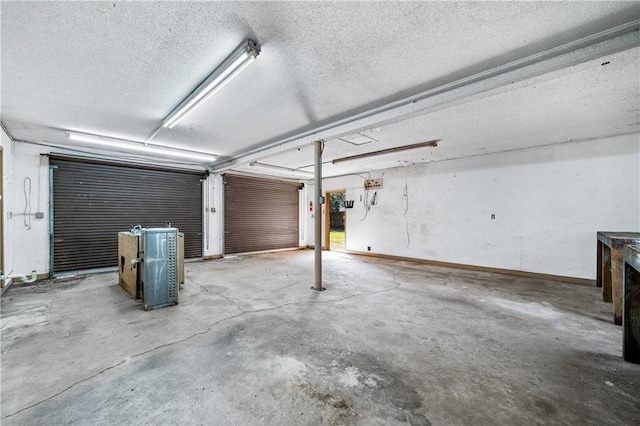 garage featuring baseboards