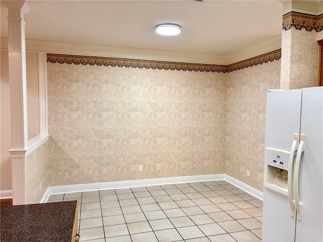 734 Natchez Trail Ct, Mobile, AL 36609 - unfurnished room featuring crown molding, light tile patterned floors, baseboards, and ornate columns