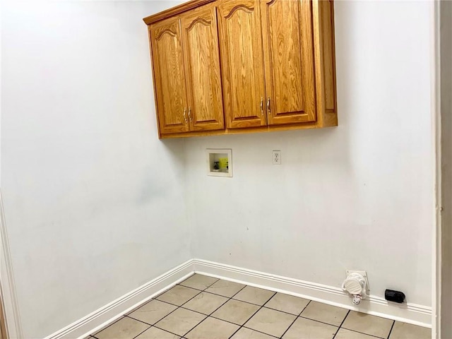734 Natchez Trail Ct, Mobile, AL 36609 - laundry room featuring cabinet space, light tile patterned flooring, baseboards, and washer hookup