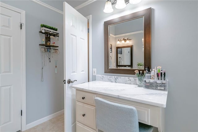 bathroom featuring vanity, ornamental molding, and tile patterned floors