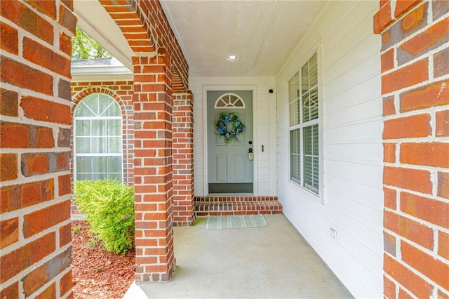 doorway to property featuring a porch