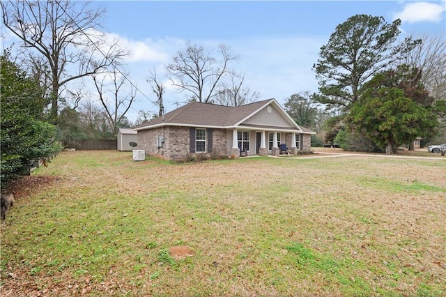 single story home with a front yard