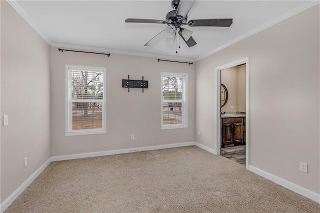 interior space with ceiling fan and crown molding