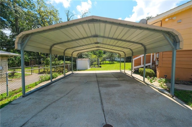 view of parking featuring a carport and a yard