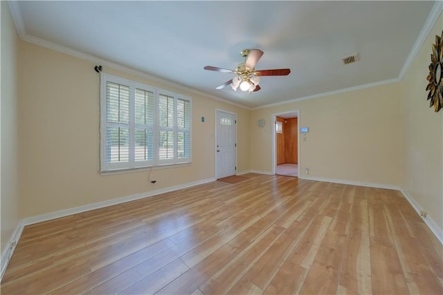 unfurnished room featuring crown molding, light hardwood / wood-style floors, and ceiling fan