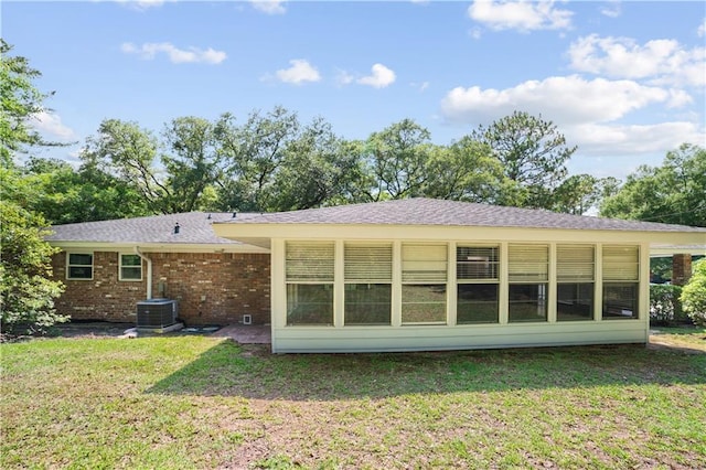 1008 Chalet Dr W, Mobile, AL 36608 - back of property featuring a lawn and brick siding