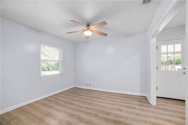 1008 Chalet Dr W, Mobile, AL 36608 - unfurnished room featuring light wood-style floors and a ceiling fan