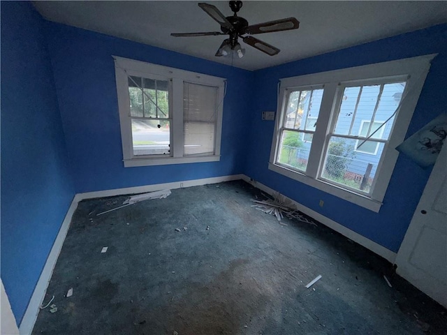 spare room featuring ceiling fan