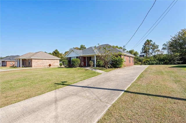 single story home with a front yard