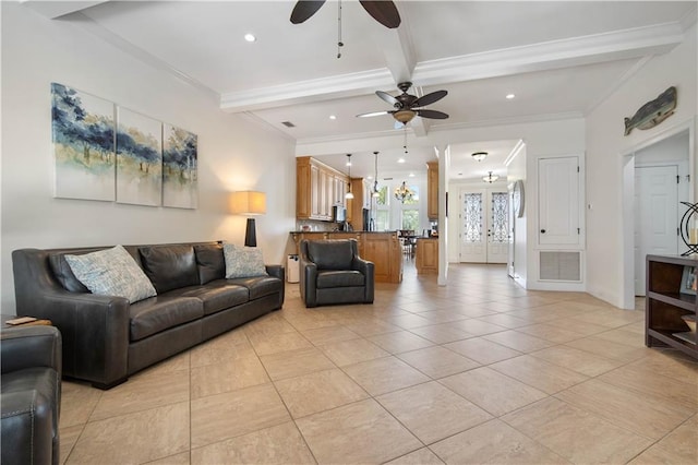 tiled living room with ornamental molding, beamed ceiling, and ceiling fan