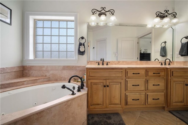 bathroom with vanity, a relaxing tiled tub, and tile patterned floors