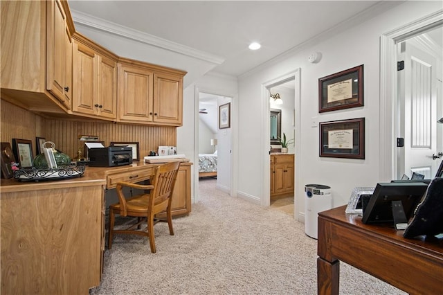 carpeted home office featuring ornamental molding