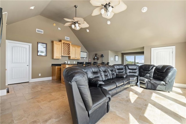 living room featuring high vaulted ceiling and ceiling fan