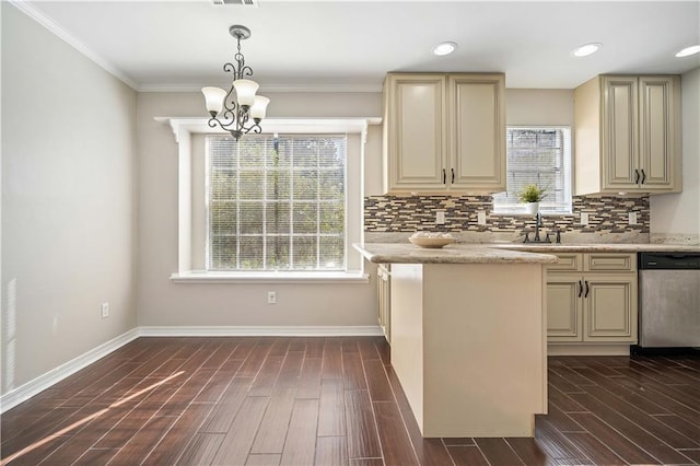 kitchen with dishwasher, decorative light fixtures, dark wood-type flooring, and a wealth of natural light