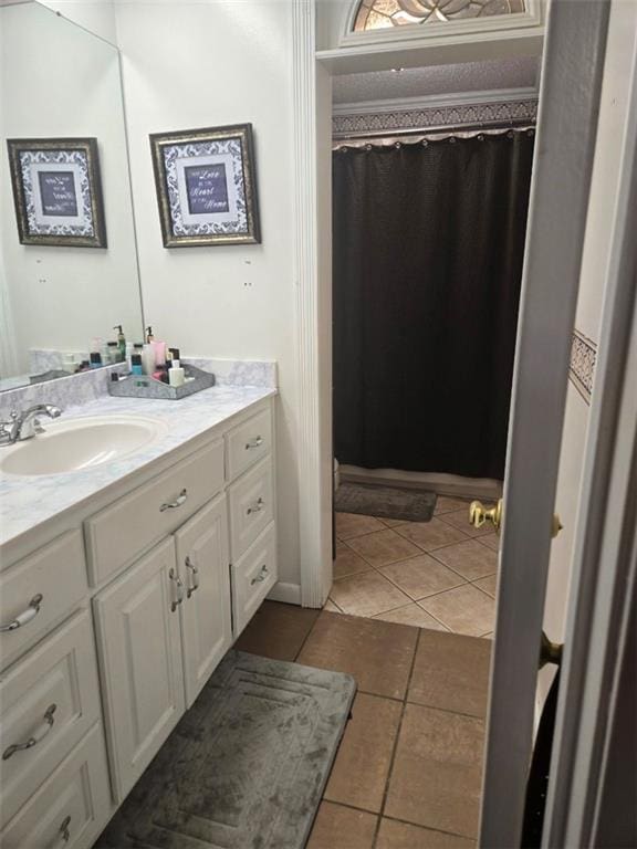 1832 Aden Rd, Mobile, AL 36695 - full bath featuring vanity, tile patterned floors, and a shower with curtain