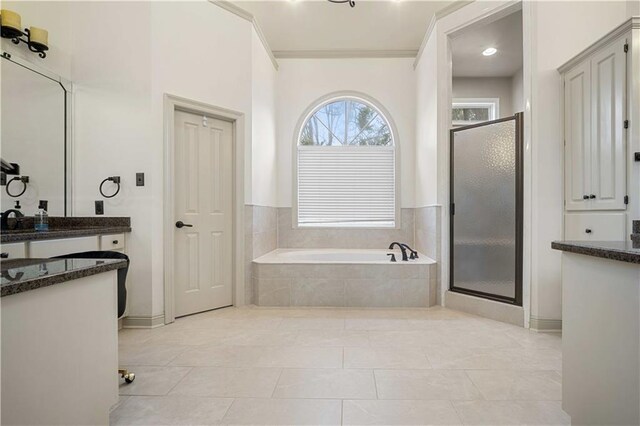 6721 Stonebrook Dr N, Mobile, AL 36695 - full bath with vanity, a garden tub, a stall shower, crown molding, and tile patterned floors