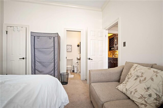 6721 Stonebrook Dr N, Mobile, AL 36695 - bedroom with carpet, crown molding, connected bathroom, and baseboards
