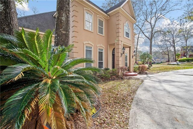 6721 Stonebrook Dr N, Mobile, AL 36695 - view of property exterior featuring stucco siding