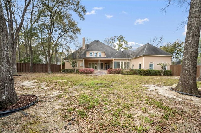 6721 Stonebrook Dr N, Mobile, AL 36695 - view of front of property with a chimney and stucco siding