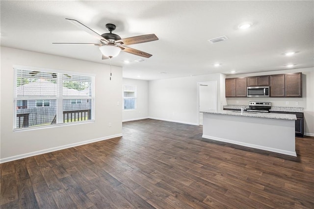 10529 Wales Ln, Spanish Fort, AL 36527 - kitchen featuring appliances with stainless steel finishes, dark wood finished floors, ceiling fan, dark brown cabinets, and recessed lighting