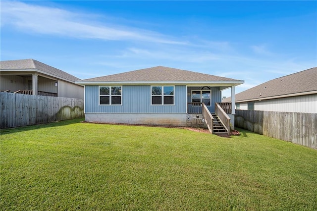 10529 Wales Ln, Spanish Fort, AL 36527 - back of property featuring a fenced backyard, stairs, and a shingled roof