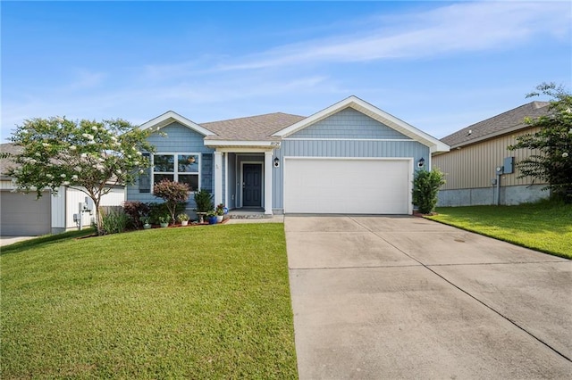 10529 Wales Ln, Spanish Fort, AL 36527 - ranch-style house featuring a garage, a front lawn, and driveway