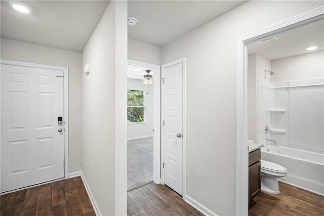 10529 Wales Ln, Spanish Fort, AL 36527 - corridor featuring dark wood-style flooring and baseboards