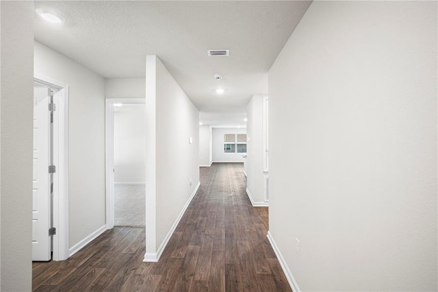 10529 Wales Ln, Spanish Fort, AL 36527 - corridor with dark wood-style floors
