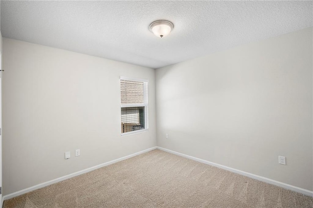 10529 Wales Ln, Spanish Fort, AL 36527 - carpeted spare room featuring a textured ceiling and baseboards