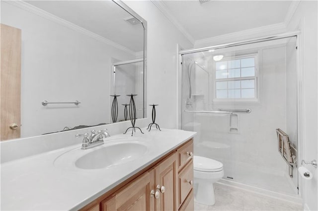 bathroom with tile patterned floors, vanity, crown molding, toilet, and a shower with shower door