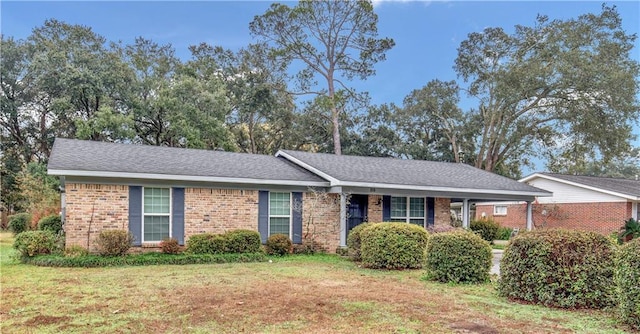 ranch-style house with a front yard