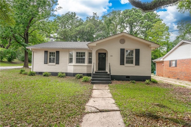 view of front facade with a front yard