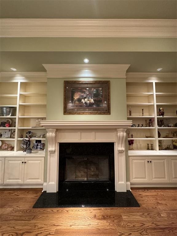 details featuring crown molding and hardwood / wood-style floors