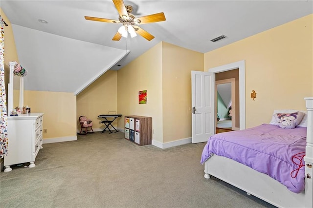 bedroom with ceiling fan, carpet, visible vents, lofted ceiling, and baseboards