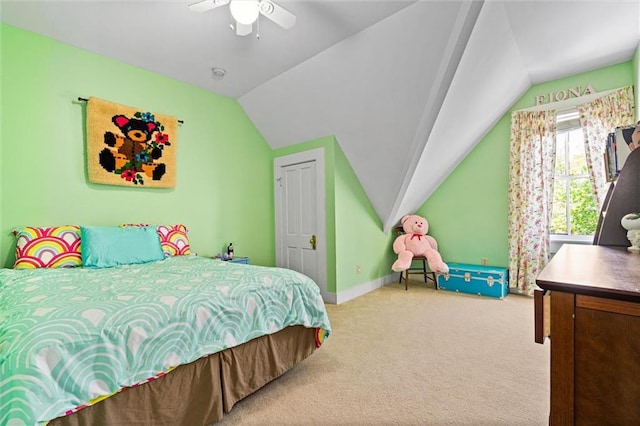 bedroom featuring ceiling fan, baseboards, lofted ceiling, and carpet floors