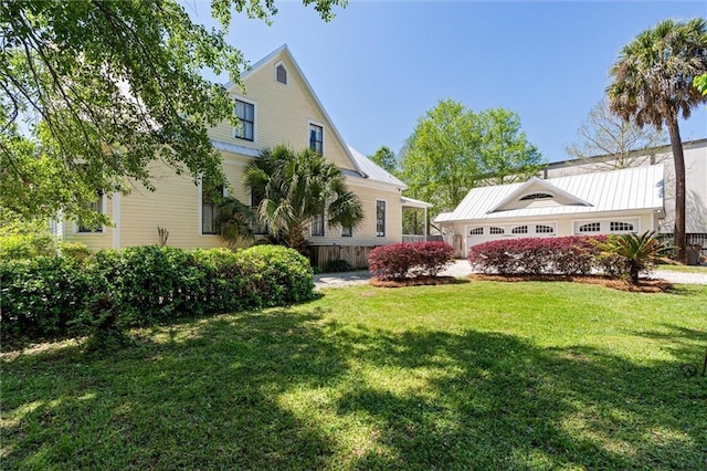 view of yard featuring an attached garage