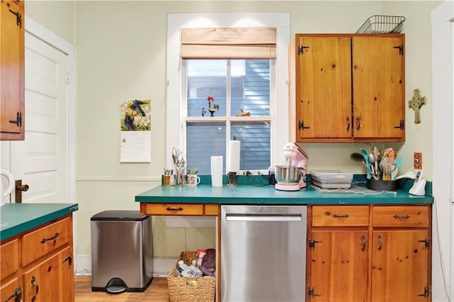 kitchen featuring stainless steel dishwasher