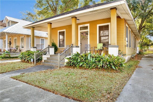 bungalow-style house featuring a porch