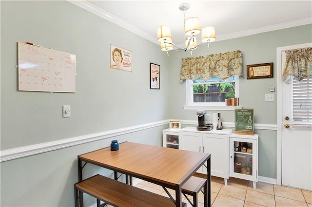 dining space featuring ornamental molding, light tile patterned flooring, and a chandelier