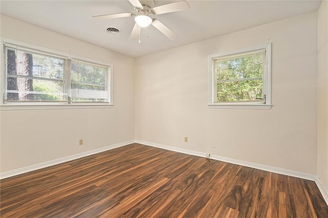 5416 Hilltop Dr N, Mobile, AL 36608 - spare room featuring dark wood-style flooring and ceiling fan